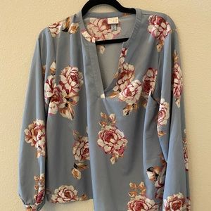 A new Day light blue floral blouse